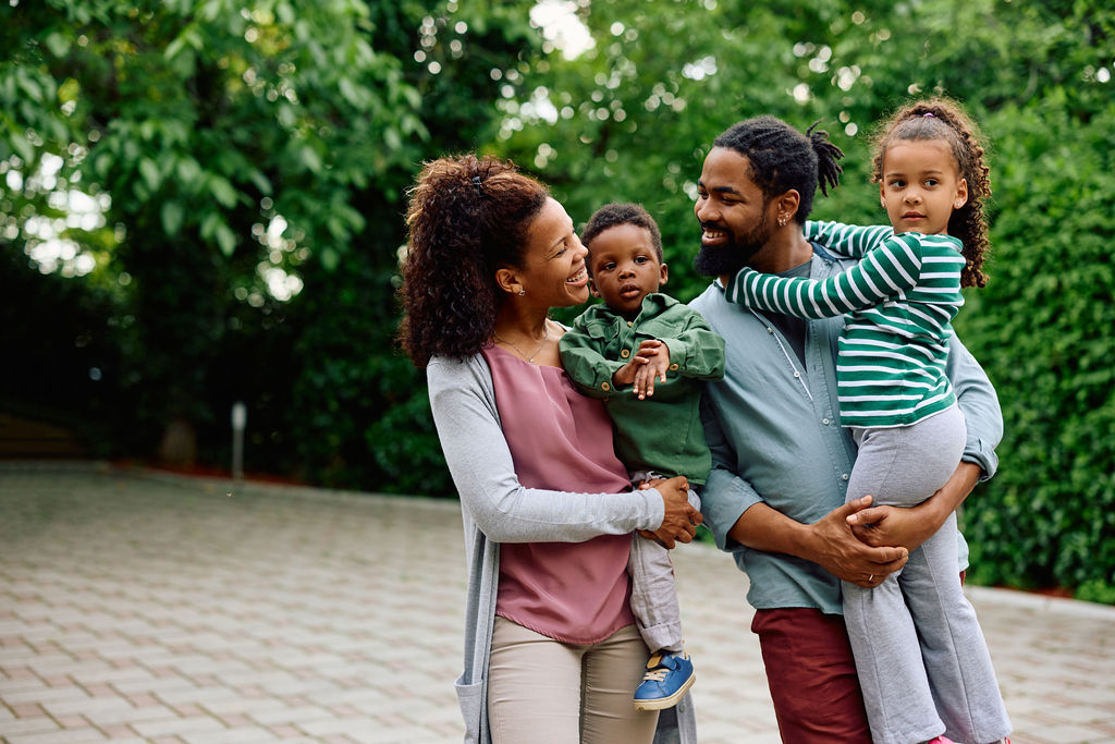 A family enjoying a walk in the park